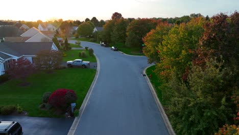 american neighborhood during golden hour on autumn evening