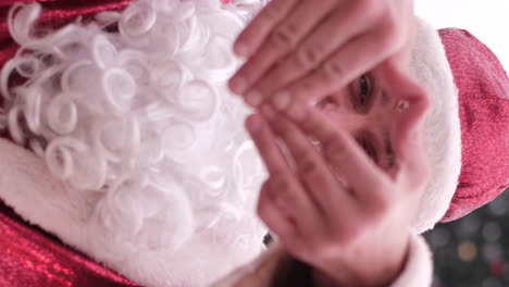 Santa Claus Shows a Heart Sign with his Hands Santa Claus Shows a Heart Sign with his Hands