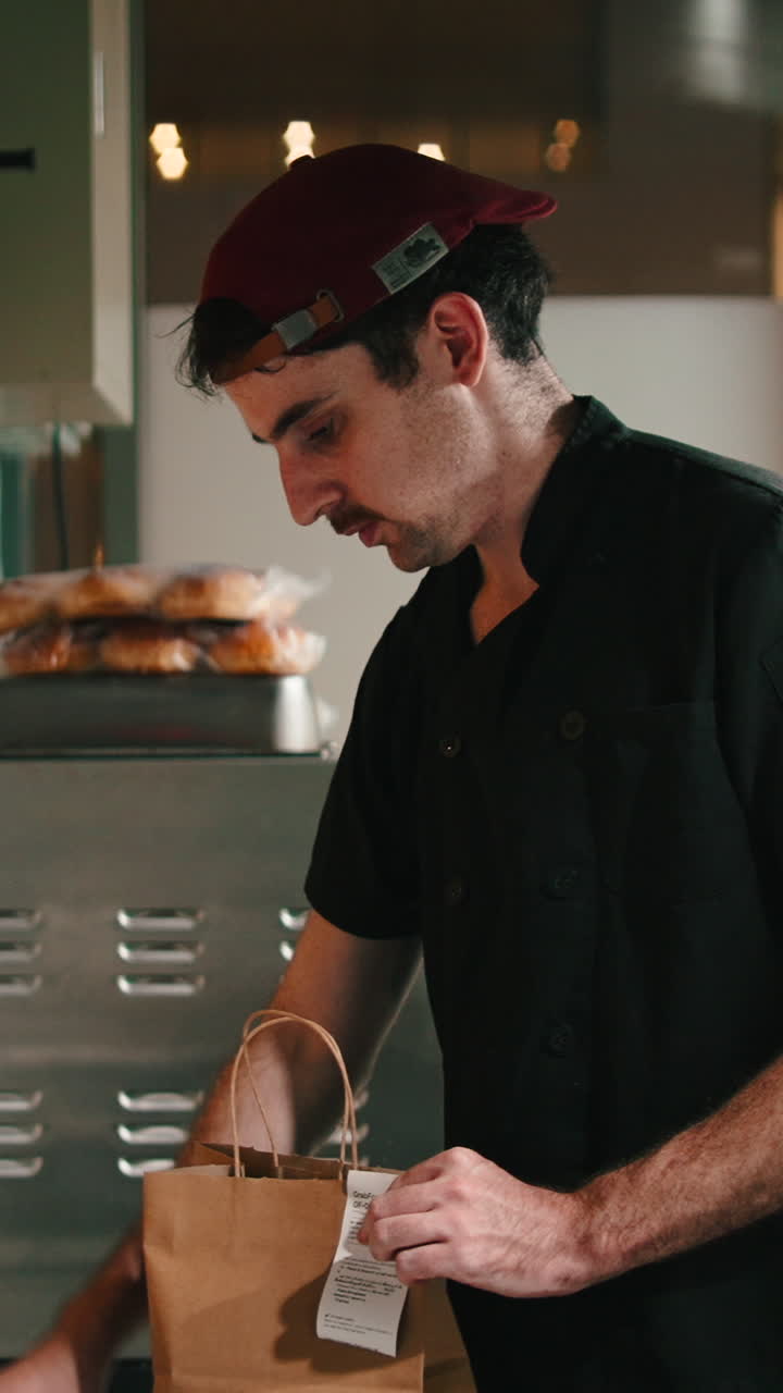 Chef packing food in a bakery