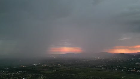 aerial-shot-of-drone-flying-next-to-a-storm-cloud-at-high-altitude