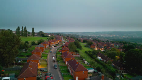 explore the famed dewsbury moore council estate in the uk through drone-captured video, showcasing urban council-owned housing, red-brick terraced homes, and the industrial yorkshire backdrop