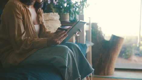 a unrecognizable woman shopping online