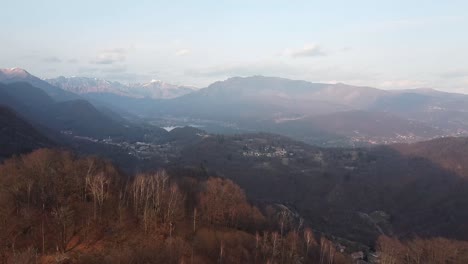 Opening-shot-of-Orta-Lake-and-mountain-range-surrounding-it