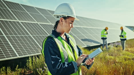 Engineering-woman,-tablet-and-solar-panels