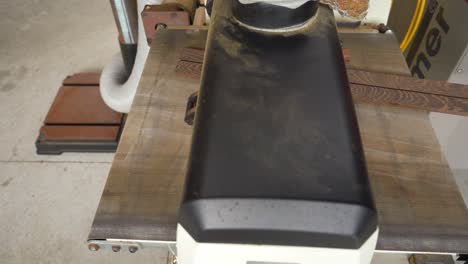 person drum sanding wenge wood planks