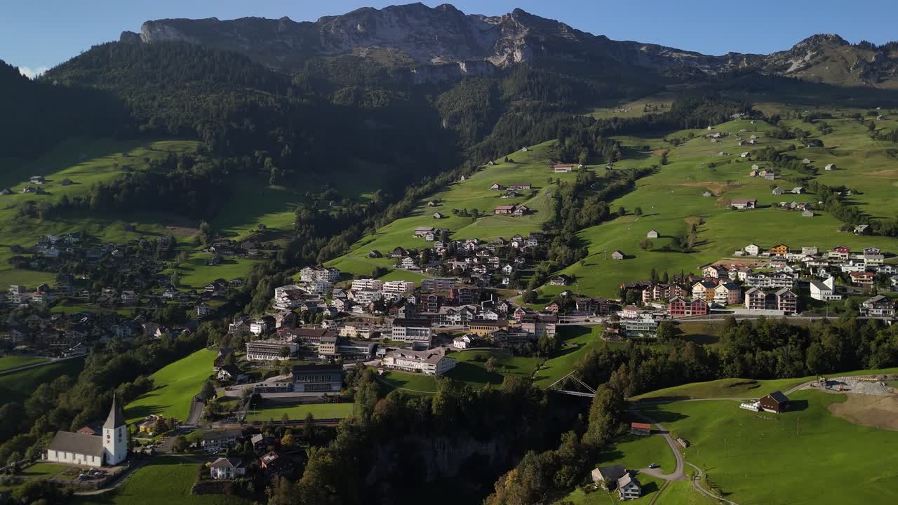 Aerial View of a Charming Village in the Swiss Alps