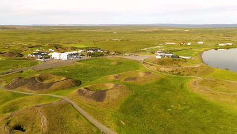 experience a bird’s-eye view of skútustaðagígar, showcasing its dramatic craters and lush surroundings, perfect for nature enthusiasts and photographers alike.