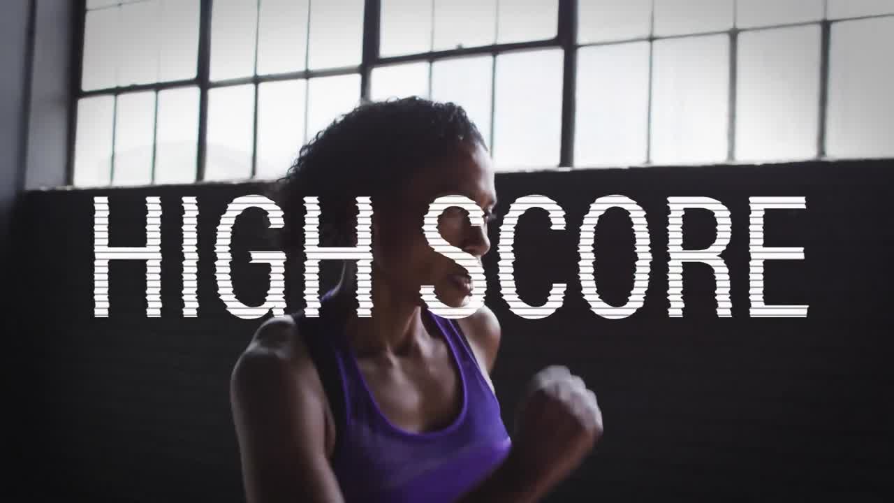 Animation of high score text over mixed race woman jogging indoors