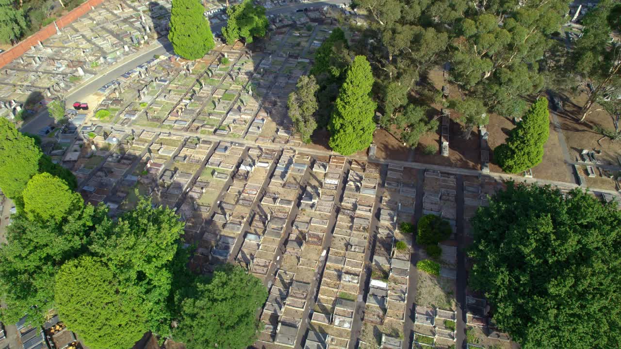 Panning aerial view over the Boroondara General Cemetery, Kew, Victoria, Australia. March 2025.