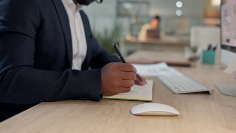 business hands, writing and planning in notebook