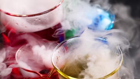 vibrant liquids reacting with smoke and tools