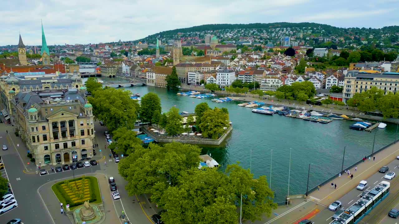 4K Drone Video of Traffic on the Quaibrücke Bridge over the Limmat River in Downtown Zurich, Switzerland