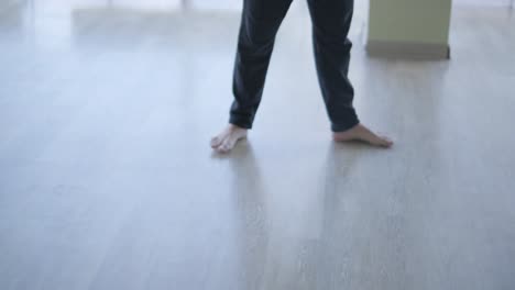 man breakdancing in modern studio