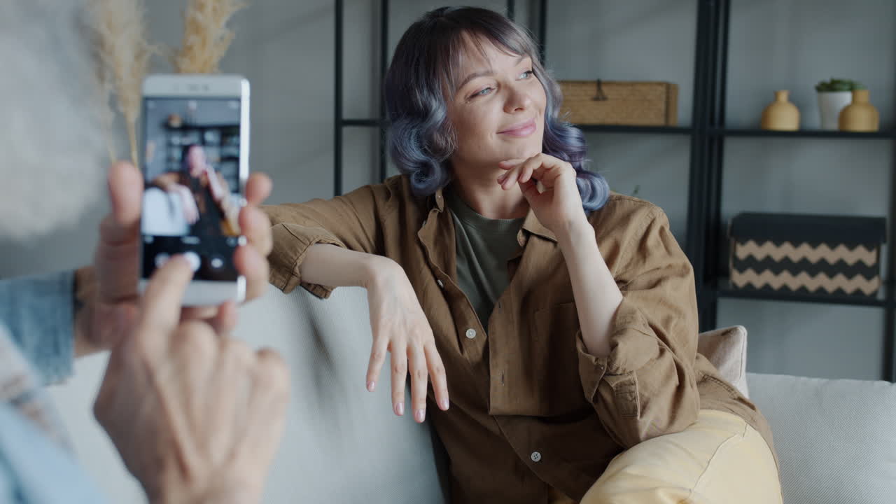 Grandparent taking photo of grandchild