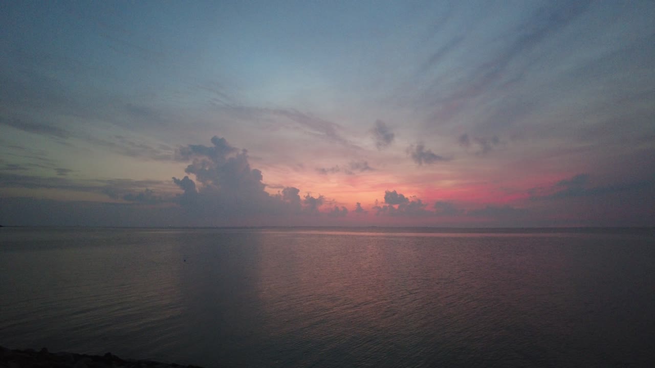 Sunset at Norderhafen (northern harbor) of the Nordstrand peninsula at the Wadden Sea National Park in Schleswig-Holstein, Germany, Europe