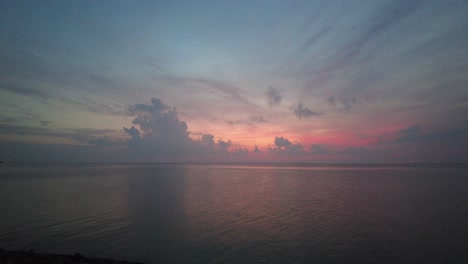 sunset at norderhafen (northern harbor) of the nordstrand peninsula at the wadden sea national park in schleswig-holstein, germany, europe
