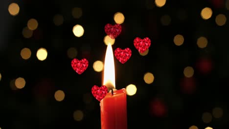 Animation-of-hearts-over-spots-and-candle