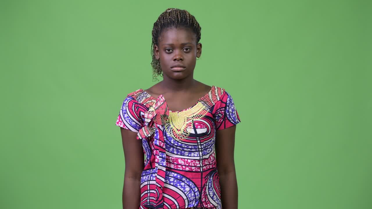 Young African woman doing three wise monkeys concept