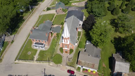 birds eye view of small church on main street usa in rural town