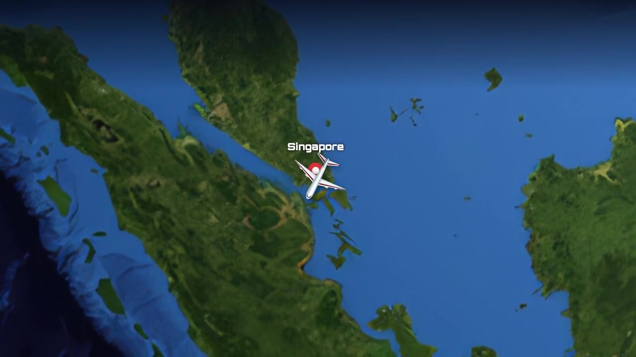Satellite view animation follows a commercial airplane flying from Denver, USA to Singapore