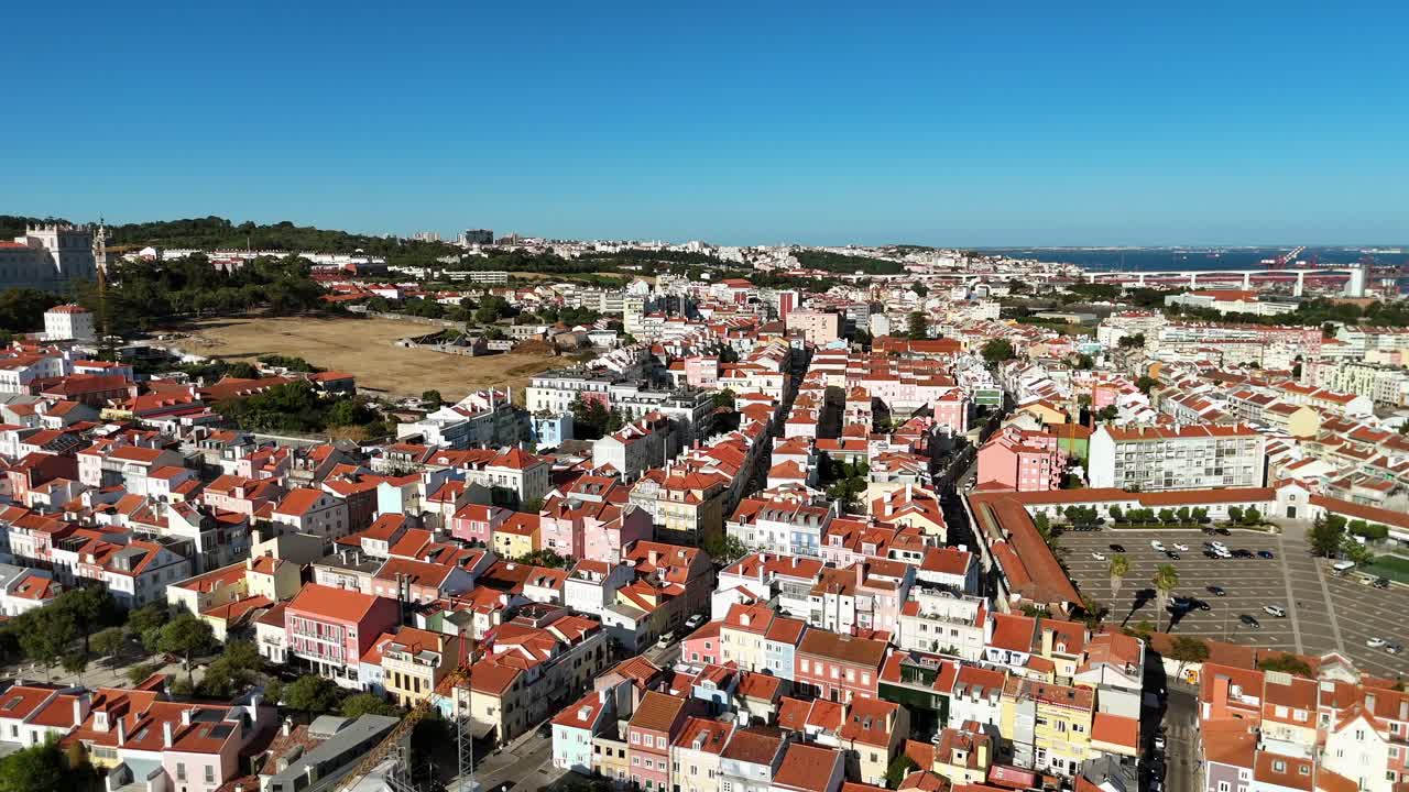 Aerial View of Lisbon Cityscape with Colorful Buildings and Red Roofs