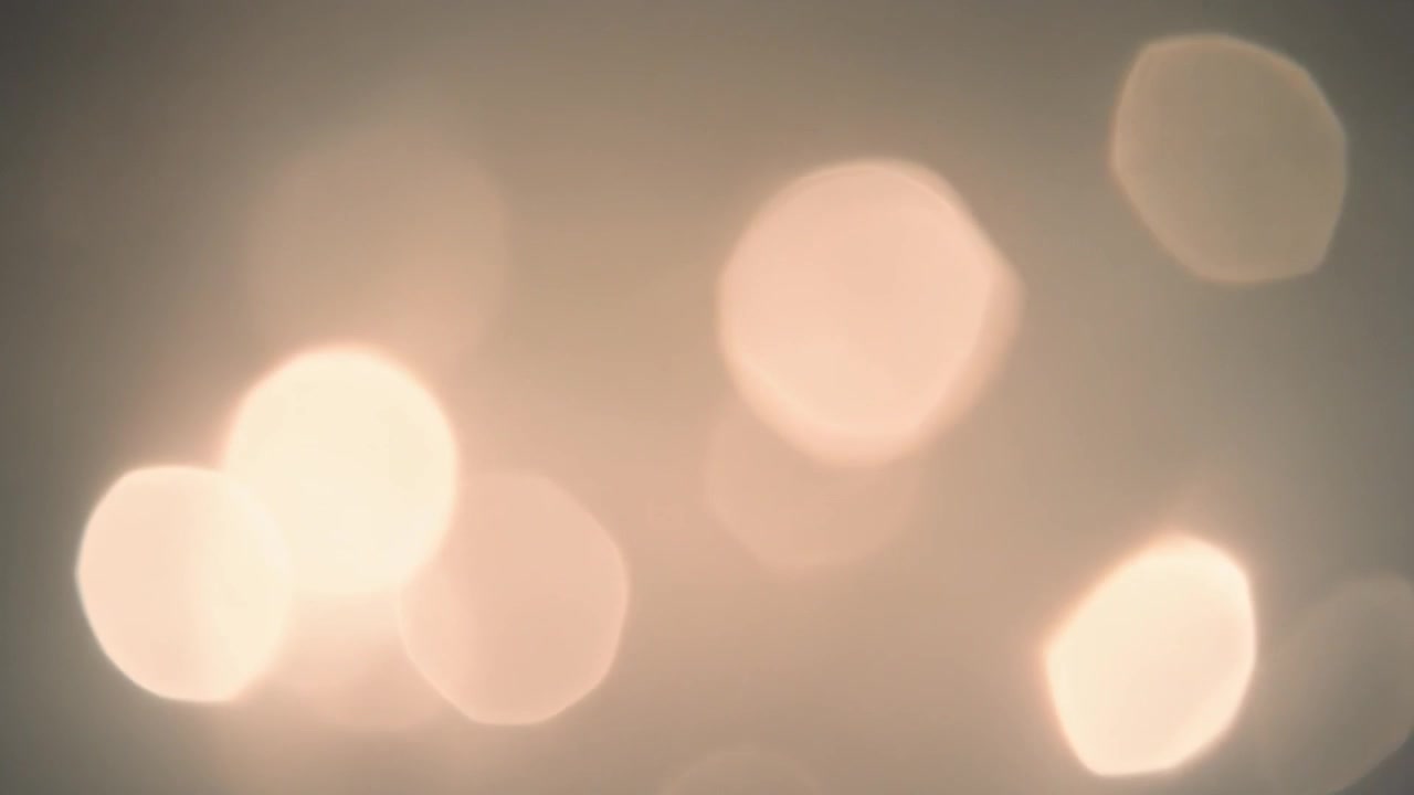 Fundo Abstrato de Luzes Bokeh Douradas Suaves e Brilhantes