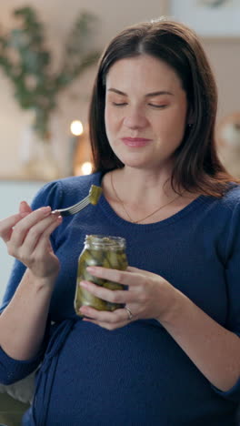 pregnant woman enjoying pickles