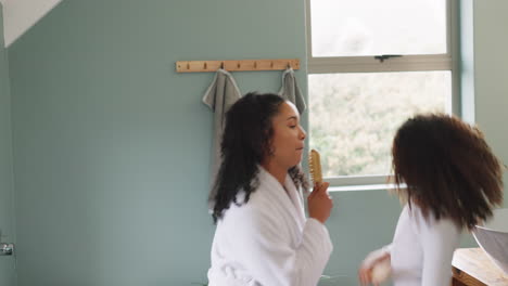 mother and daughter in bathroom