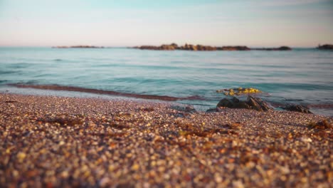 calm and slow waves crashing at the beach