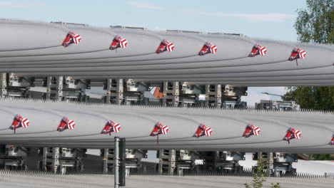 wind turbine blades stacked, renewable energy wind power scene, pan