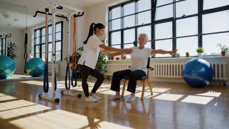 physical therapy session with senior patient