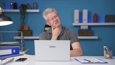 home office worker man has neck pain.