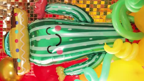 cinco de mayo cultural celebrations, festive mexican decor with cactus balloon