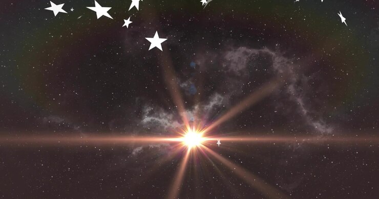 Stelle bianche che arrivano dall'alto a sinistra, si formano e poi fluttuano, mentre un bagliore dell'obiettivo cresce verso destra per evidenziare una nebulosa.