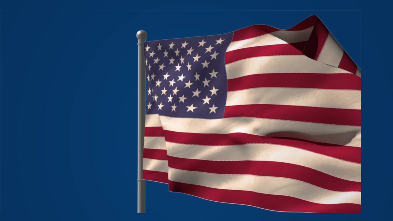 Animation af USA's flag, der vajer på blå baggrund.