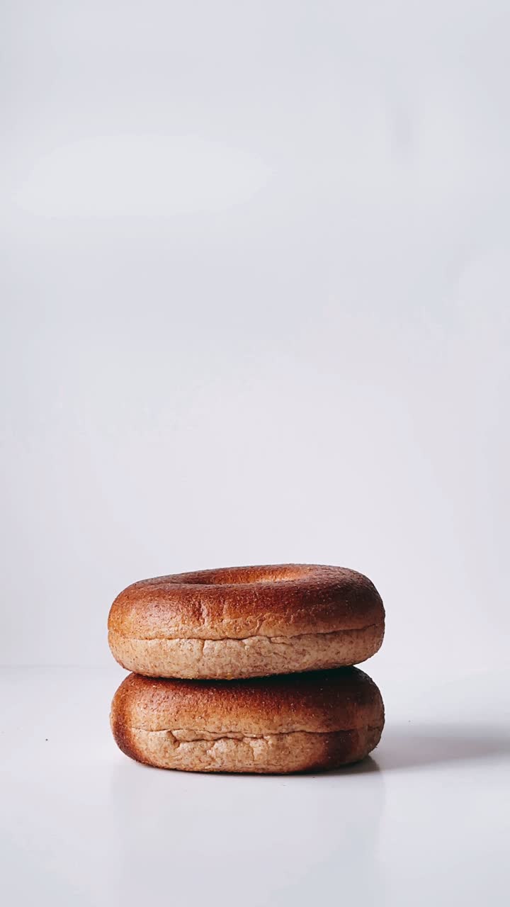 Stack of Bagels with Flowers and Jewelry