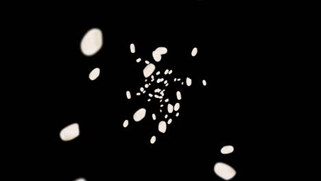 volando mucho arroz en fondo negro. granos de arroz blanco. arroz glutinoso. vegetariano. comida saludable. animación de bucle 3d de arroz girando.