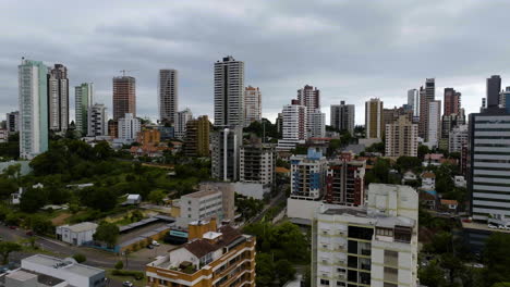 aerial view flying over apartment buildings, gloomy day in porto alegre, brazil