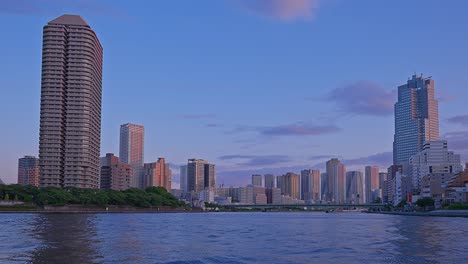 evening tokyo, tsukuda, toyosu skyscrapers and bridge the sumida river