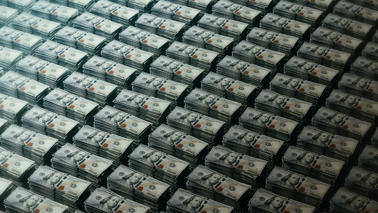 pilas de billetes de cien dólares