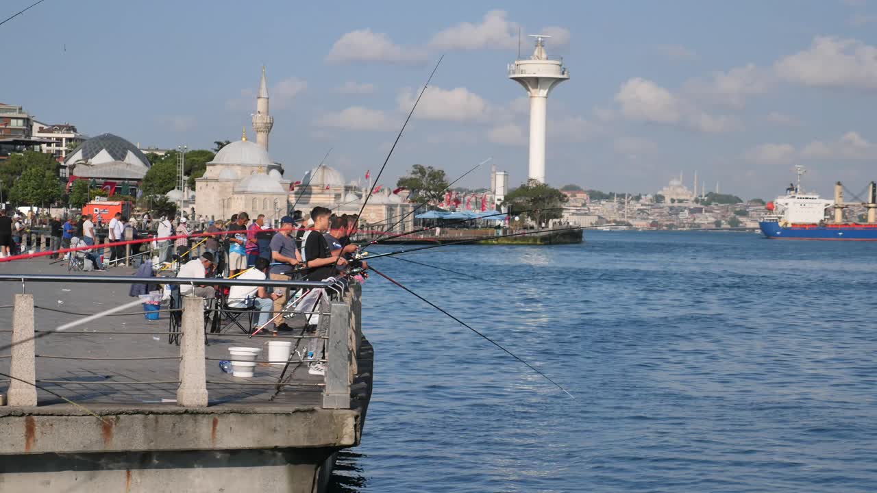 People fishing on a pier in Istanbul