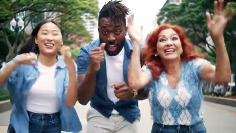 joyful celebration: a diverse group shares laughter and excitement in a lively outdoor setting, capturing the essence of friendship and happiness