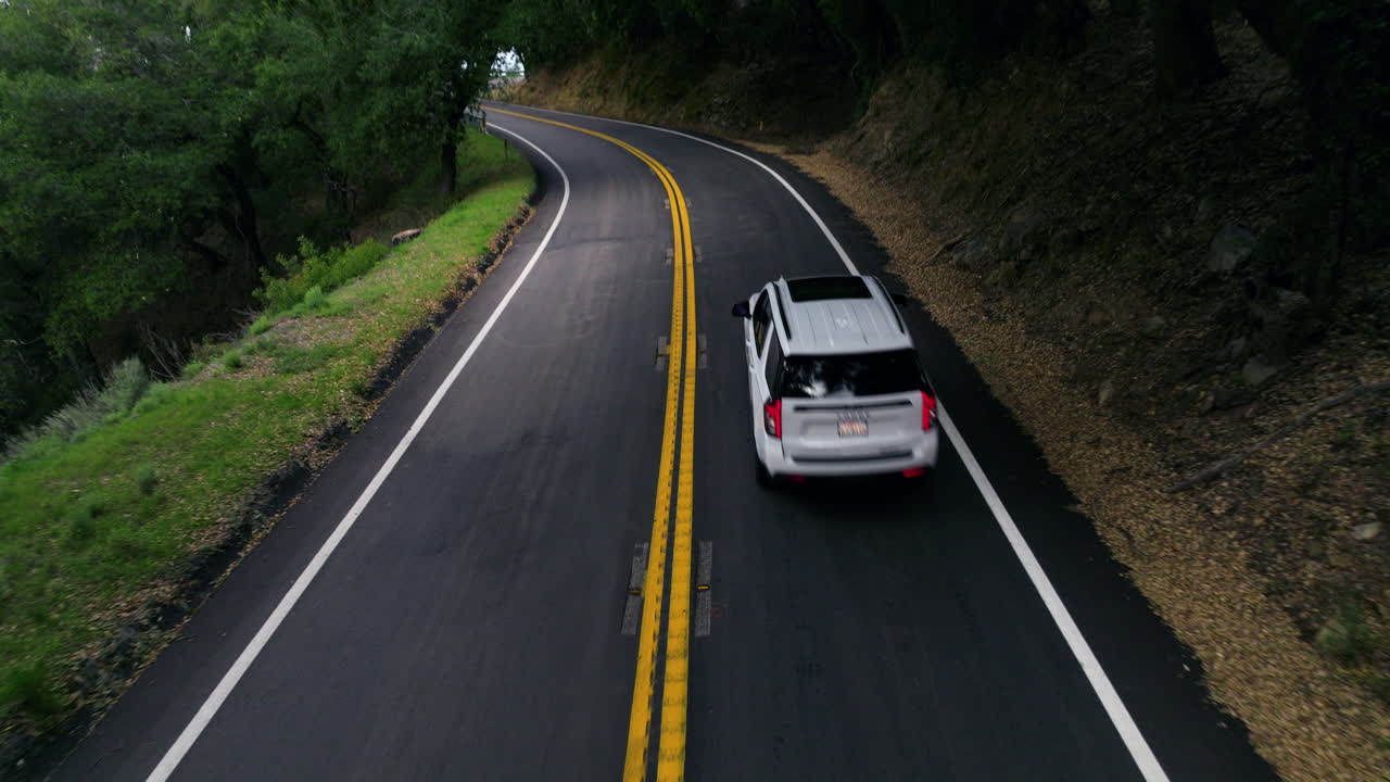 Car Driving In Palomar Divide Road In California, USA - Drone Pullback