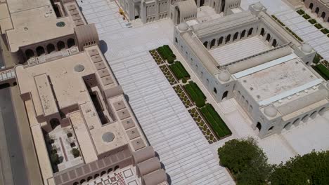 Aerial-of-stunning-Sultan-Qaboos-Grand-Mosque-with-minaret-and-dome-in-Muscat-in-the-Sultanate-of-Oman