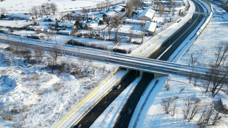 light traffic on the highway with flyover bridge at winter in gdansk, poland