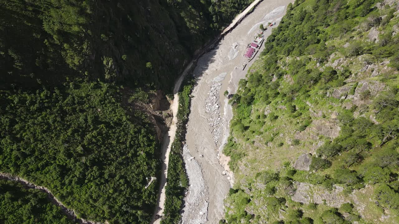The aerial view shows the Rasuwagadhi flood destroying a Friendship bridge, road, a hydropower substation, and sweeping away vehicles in Rasuwa, Nepal
