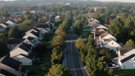 aerial dolly forward above american suburbs