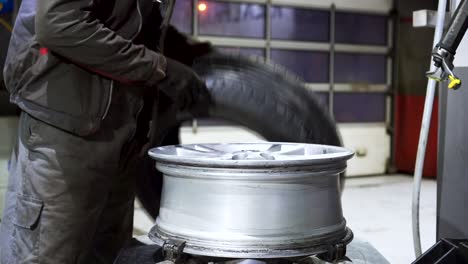 changing a tire in a garage