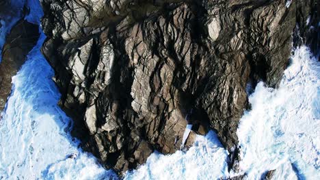 Ocean-Waves-in-Slow-Motion-with-Top-Down-View-Over-Slate-Rocks-in-Cornwall