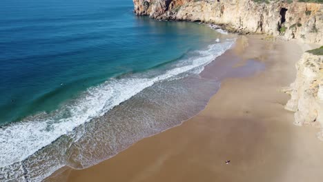 stunning beliche bay in algarve at the atlantic ocean, perfect sunny weather and crystal blue water